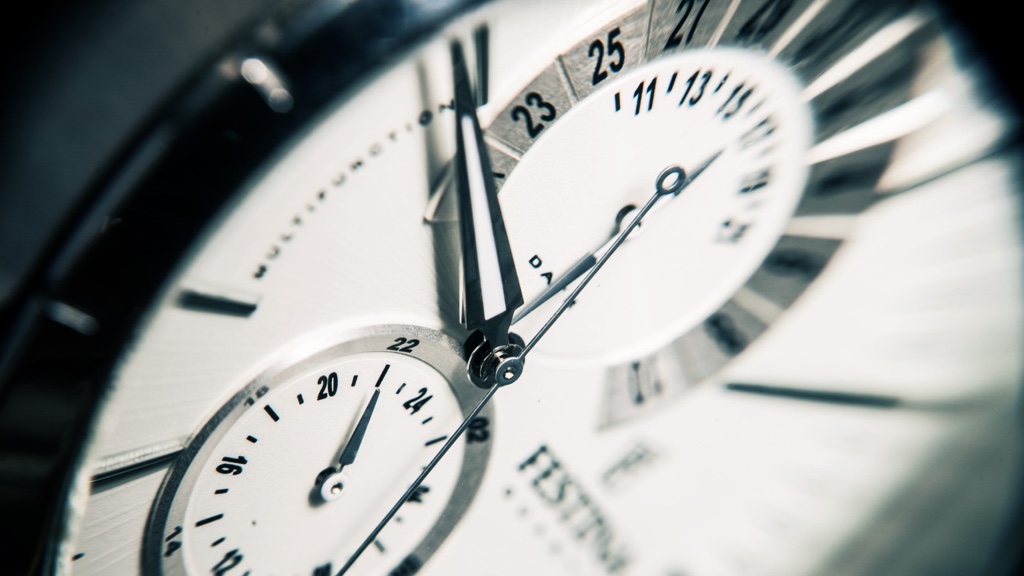 Close up of the face of a watch, black-and-white