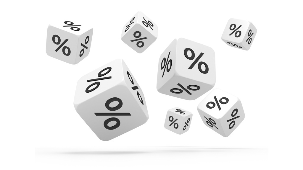 Seven floating white cubes with percentage signs on all their sides, in a white space.