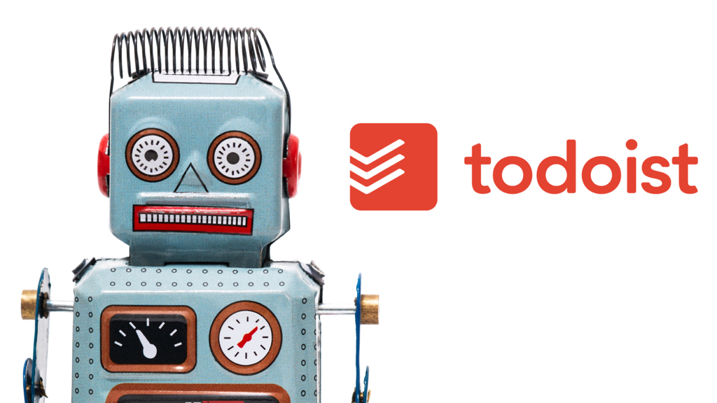 The torso and head of a greenish toy robot to the left and to the right, Todoist's logo.