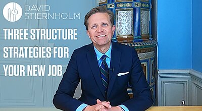 A man in a navy suit sits smiling at a table in front of an ornate blue ceramic stove, with text overlay reading "David Stiernholm – Three Structure Strategies for Your New Job."