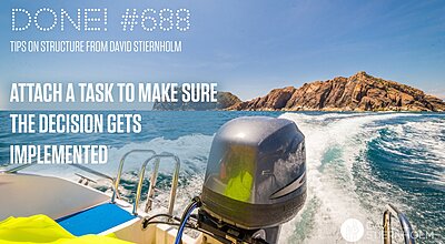 A speedboat with an outboard motor travels across blue ocean waters toward rocky islands under a clear sky.
